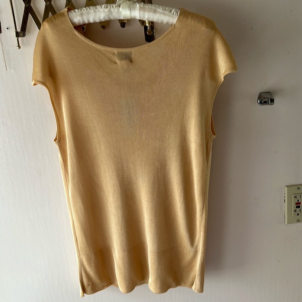 New with tags short sleeve silky feel top.